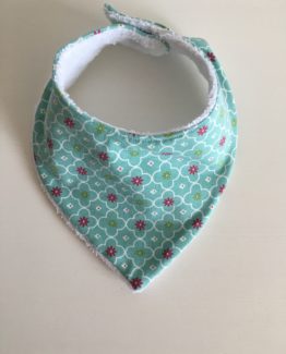 Bavoir turquoise à fleurs