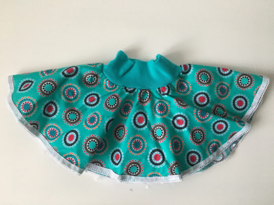 Jupe bébé avec cercles turquoises et dentelle plate